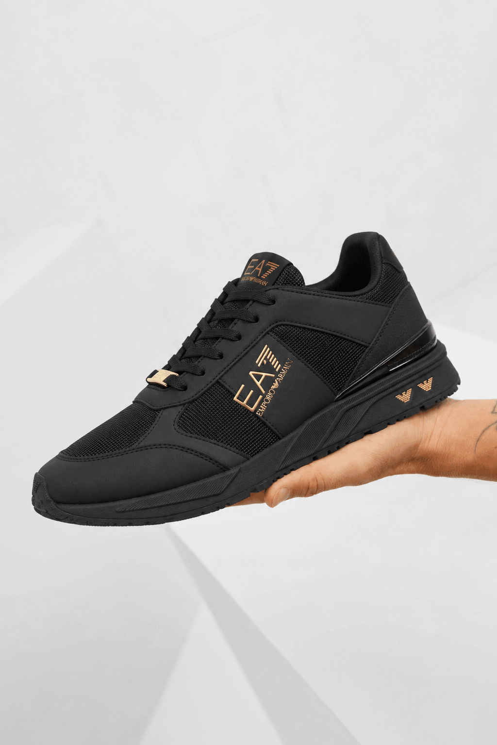 Emporio Armani EA7 7X000656 Sneakers Heren Zwart/Goud - Maat 44 - Kleur: GoudZwart | Soccerfanshop